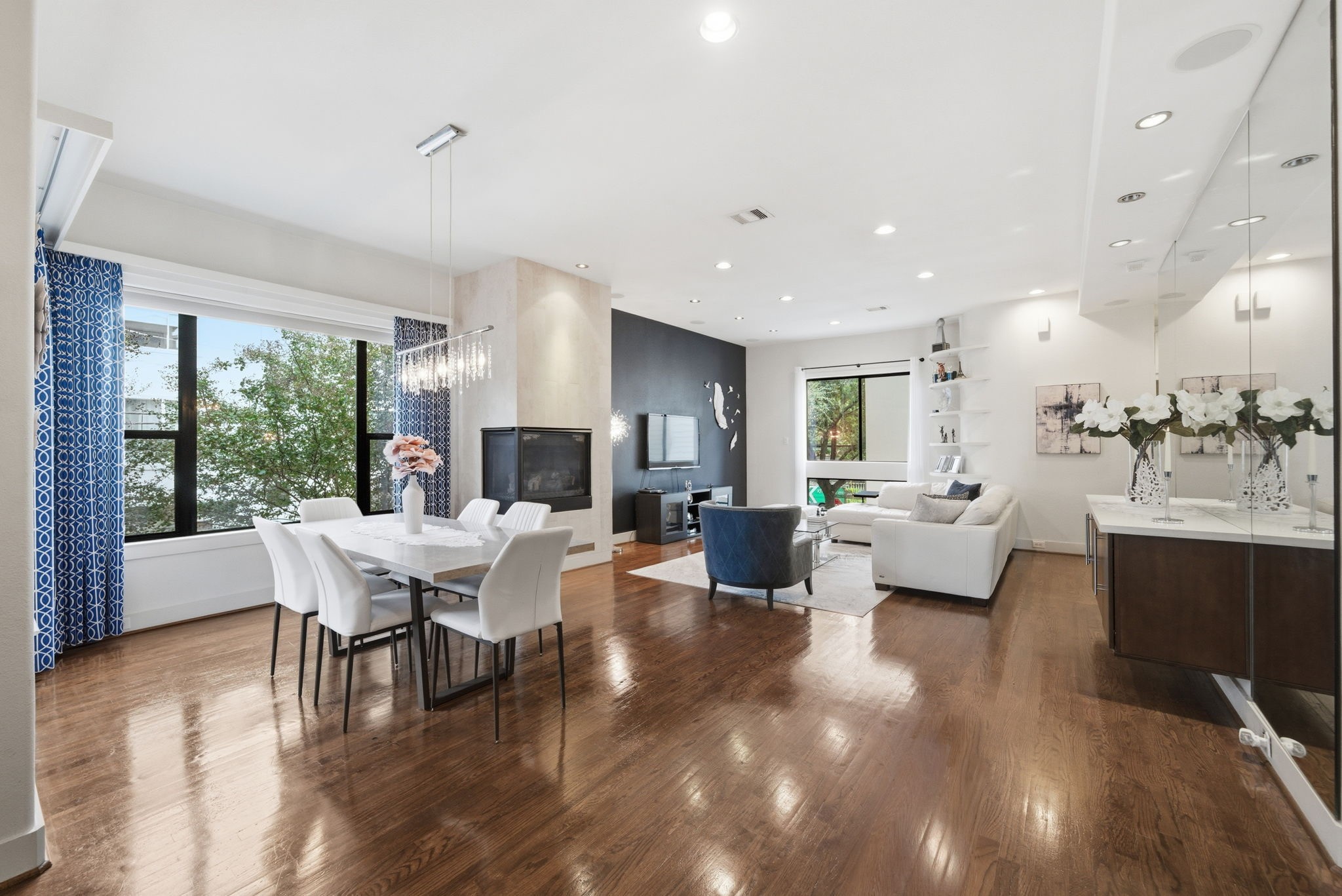 4129 Dickson Street Houston, TX 77007 - Photo 17 of 36 a living room with furniture and a wooden floor