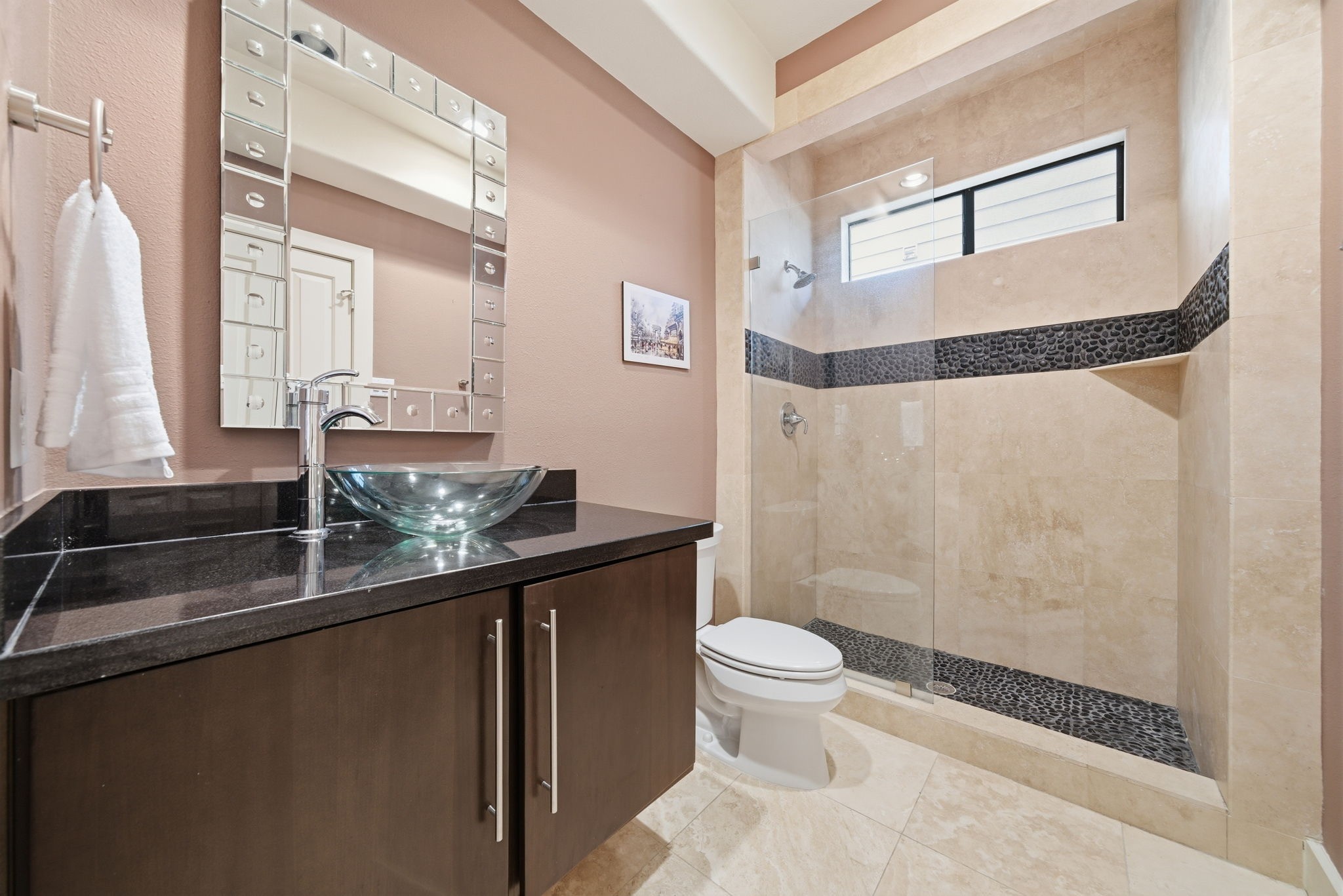 4129 Dickson Street Houston, TX 77007 - Photo 35 of 36 a bathroom with a granite countertop sink a toilet and a mirror