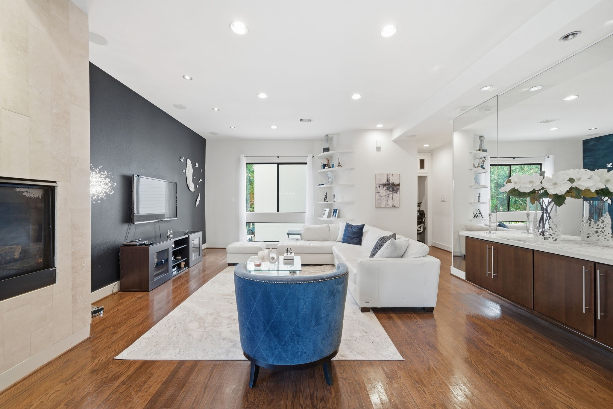 4129 Dickson Street Houston, TX 77007 - Photo 4 of 36 a living room with furniture and a wooden floor