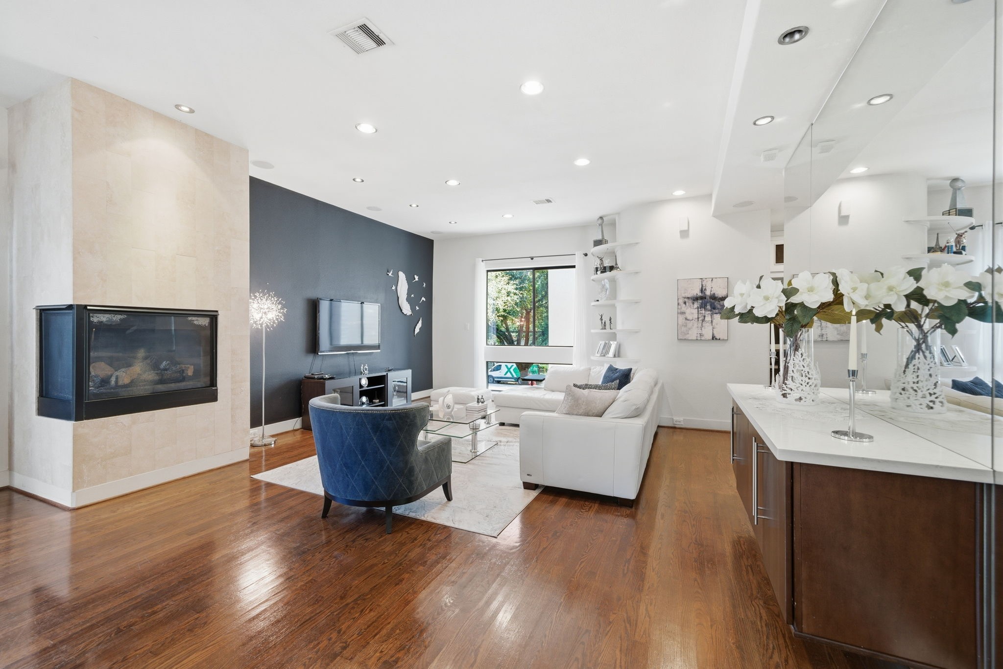 4129 Dickson Street Houston, TX 77007 - Photo 5 of 36 a living room with furniture and a wooden floor