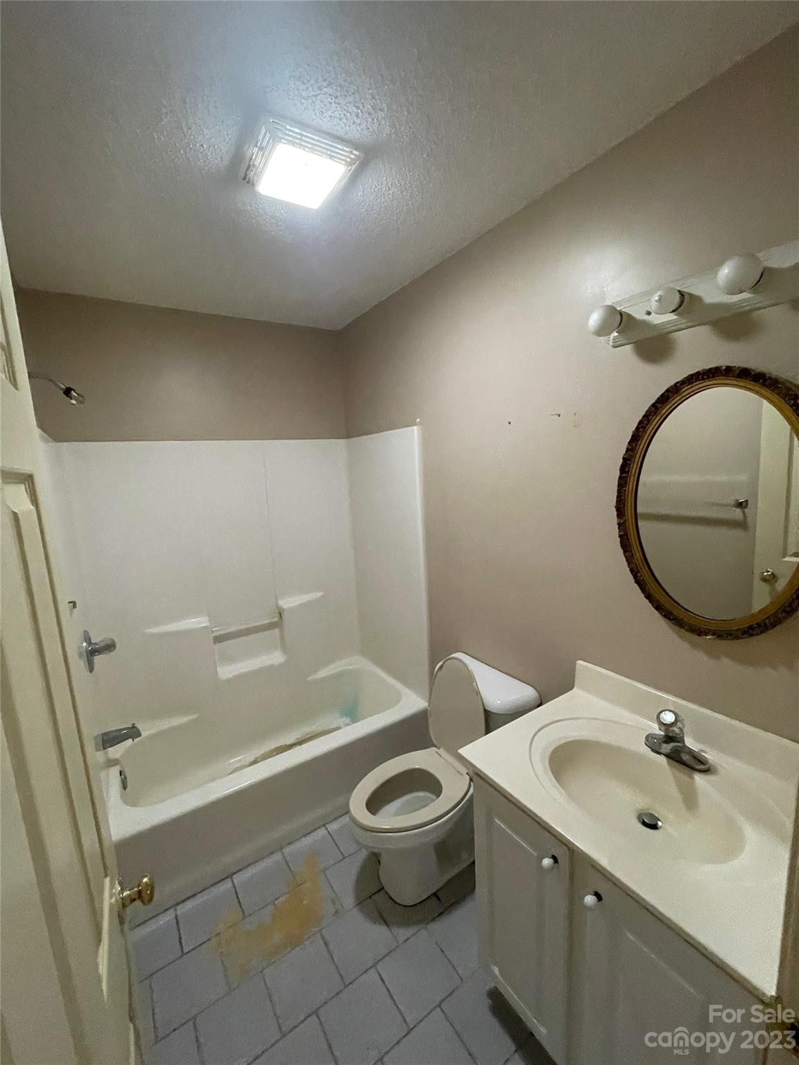 4 Grace Anna Lane Alexander, NC 28701 - Photo 16 of 38 a bathroom with a sink a toilet and a mirror