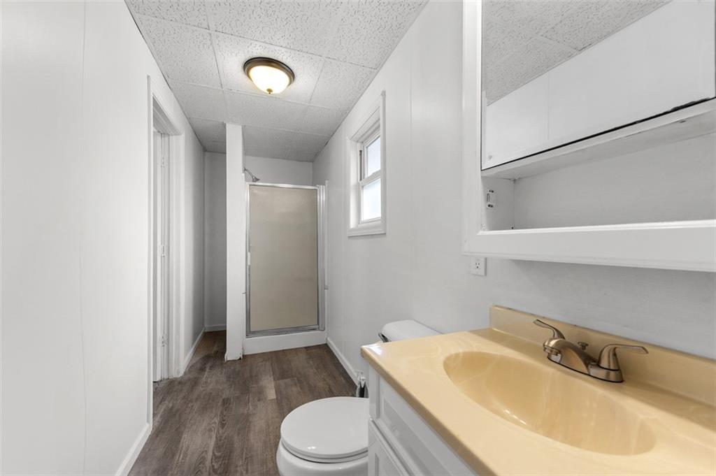 242 Union Street Dickerson Run, PA 15430 - Photo 14 of 17 a bathroom with a sink and toilet