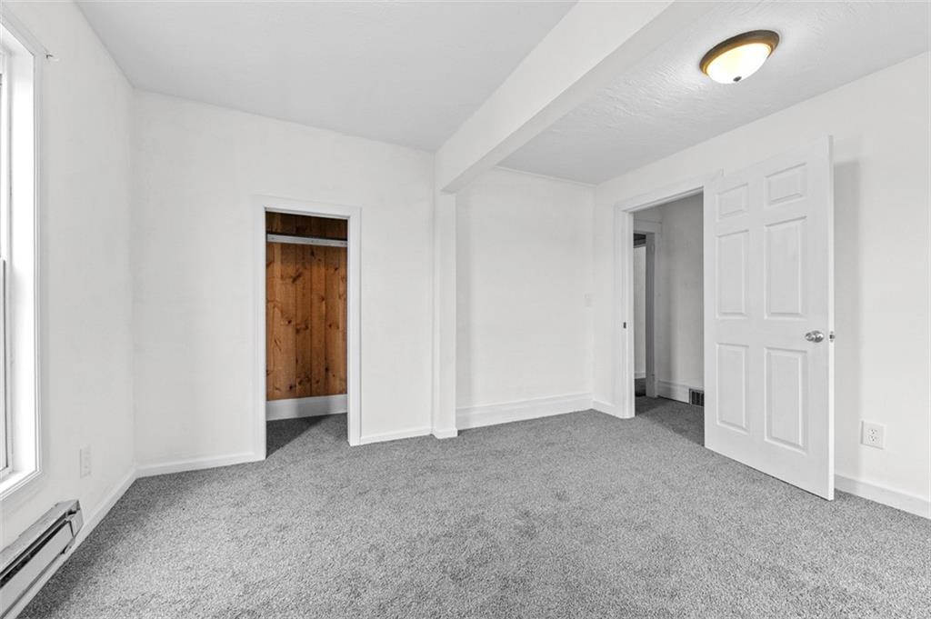 242 Union Street Dickerson Run, PA 15430 - Photo 17 of 17 an empty room with closet area