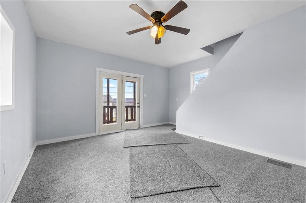 242 Union Street Dickerson Run, PA 15430 - Photo 10 of 17 a view of an empty room with a window