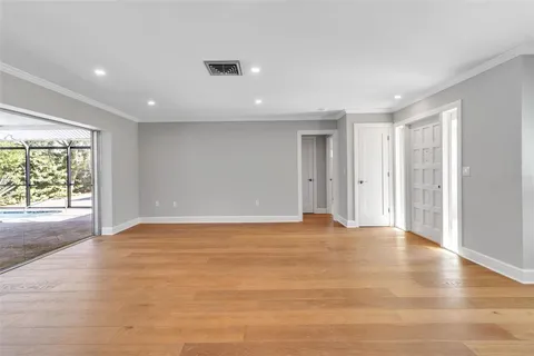 a kitchen with stainless steel appliances a sink a stove and cabinets