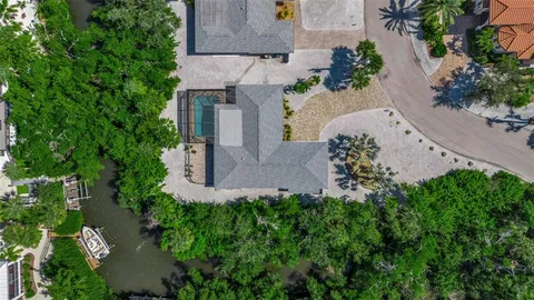 an aerial view of a house with a garden