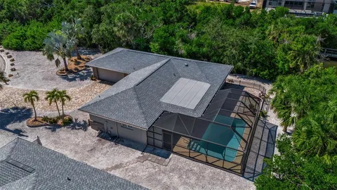 an aerial view of a house having yard