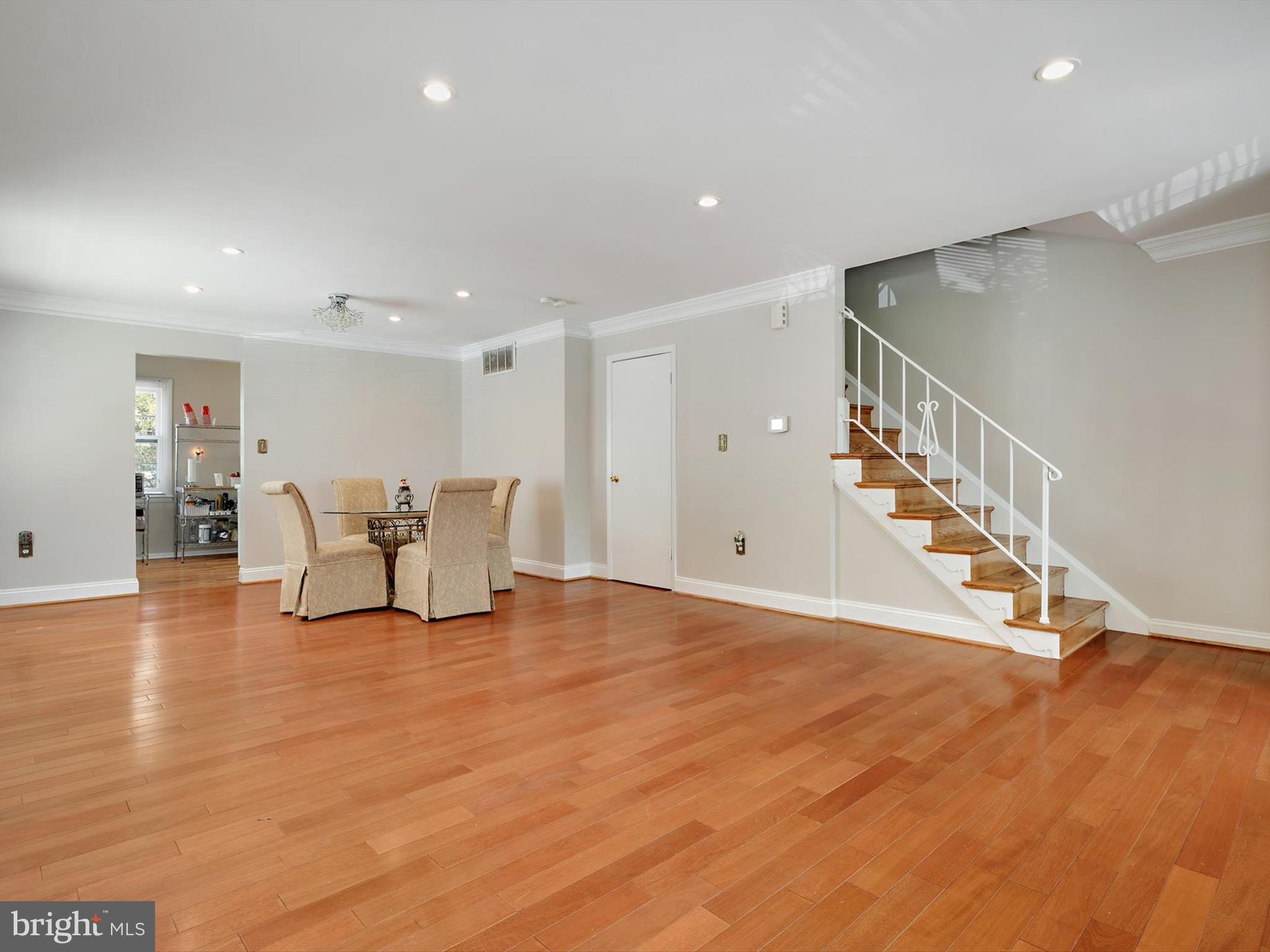8366 Imperial Drive, Unit 2A Laurel, MD 20708 - Photo 2 of 27 a view of livingroom with furniture and wooden floor