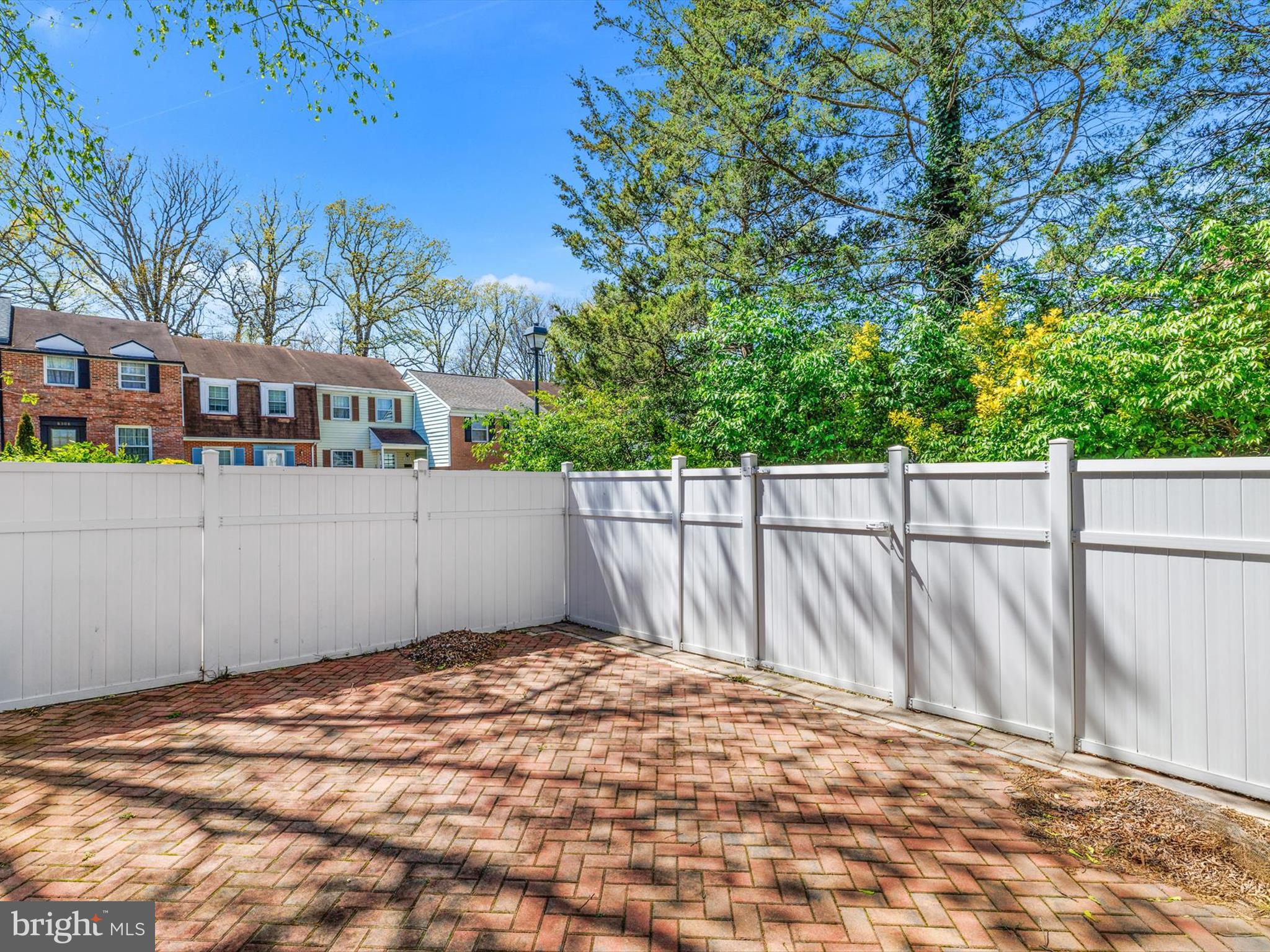 8366 Imperial Drive, Unit 2A Laurel, MD 20708 - Photo 22 of 27 a view of a backyard of the house