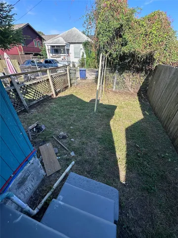 a view of a yard with furniture