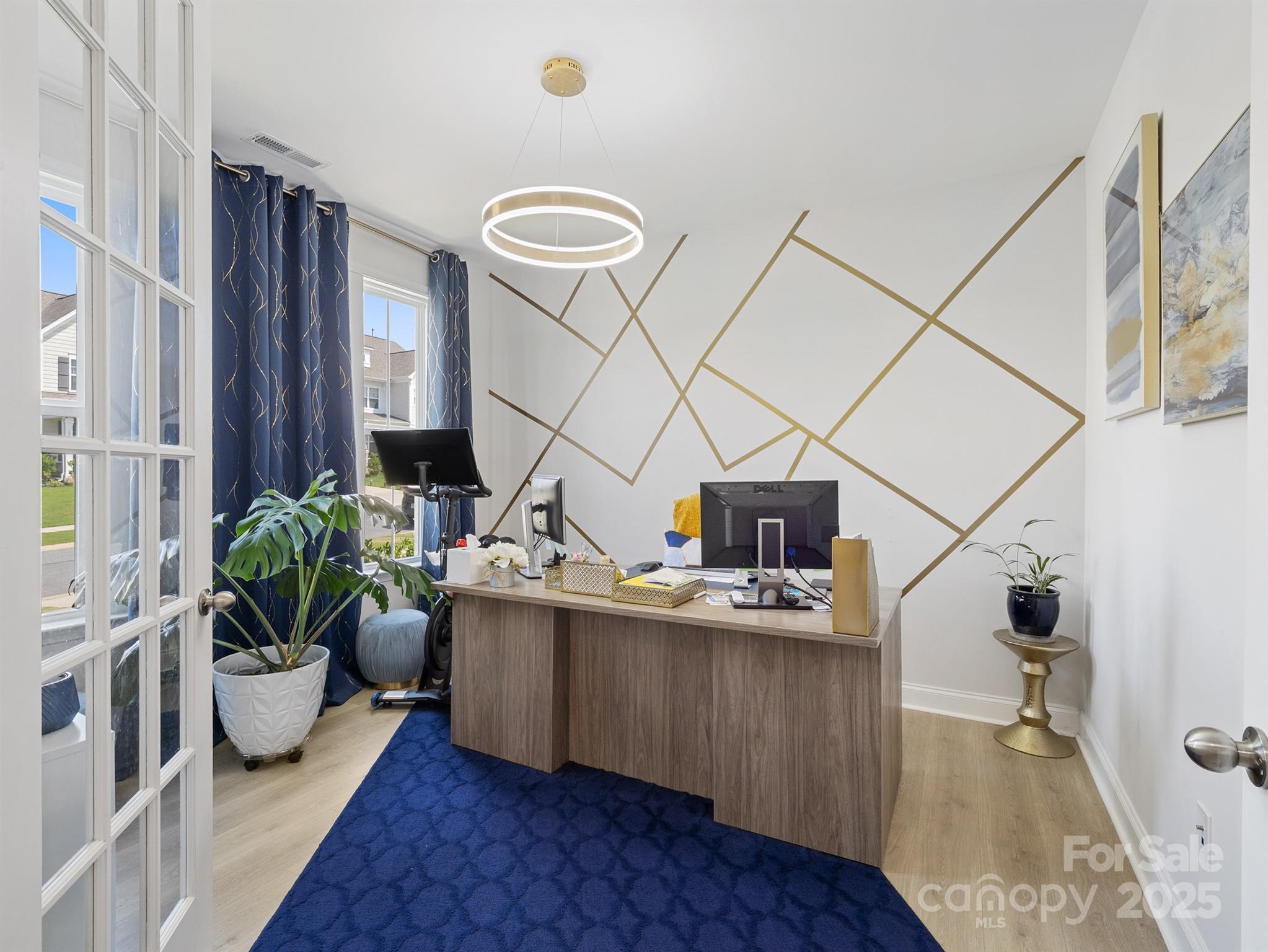 15213 Shallow Ridge Road Charlotte, NC 28278 - Photo 19 of 48 a living room with furniture and a potted plant