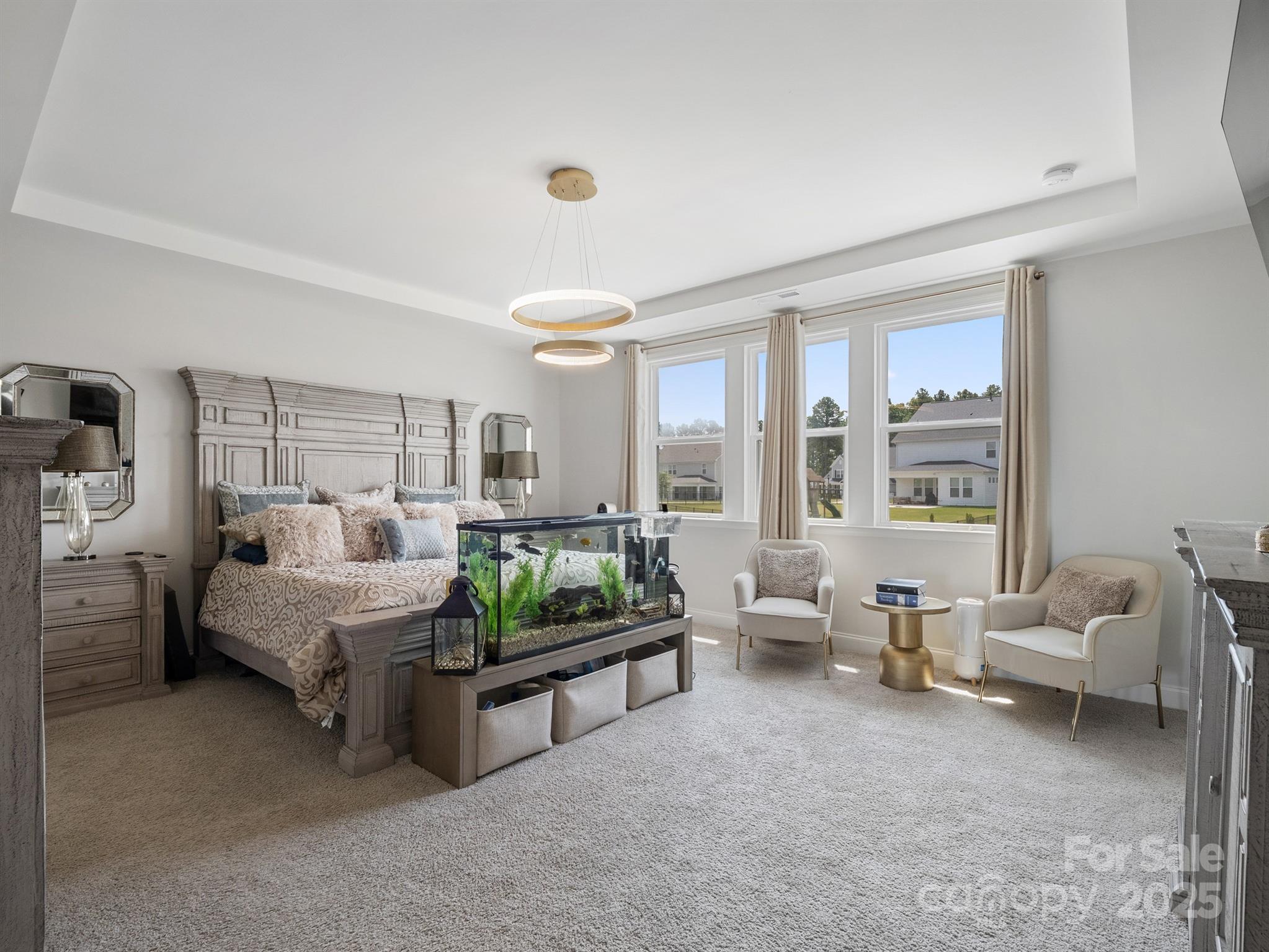 15213 Shallow Ridge Road Charlotte, NC 28278 - Photo 28 of 48 a spacious bedroom with furniture and a large window