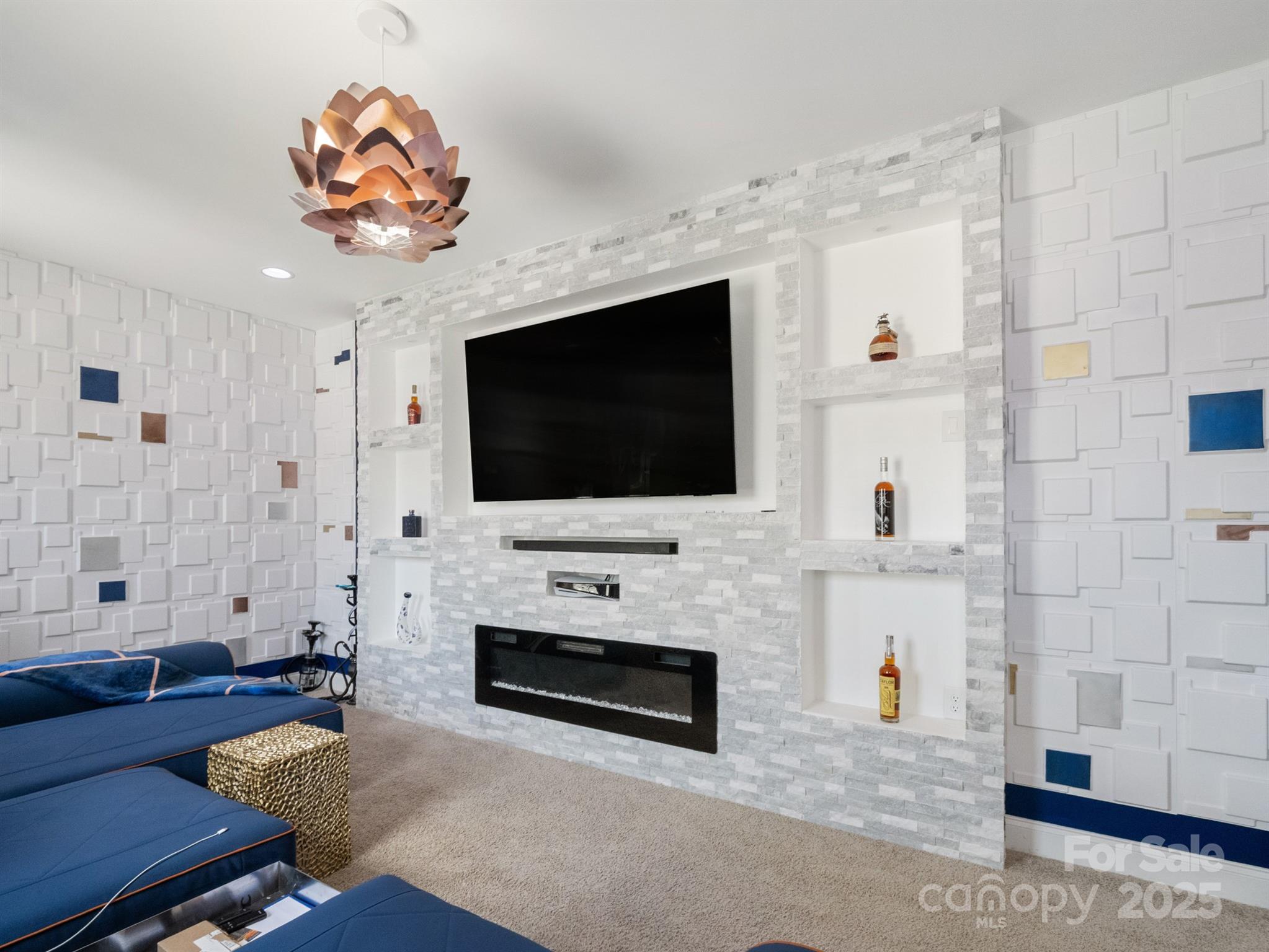 15213 Shallow Ridge Road Charlotte, NC 28278 - Photo 33 of 48 a living room with furniture a flat screen tv and a fireplace