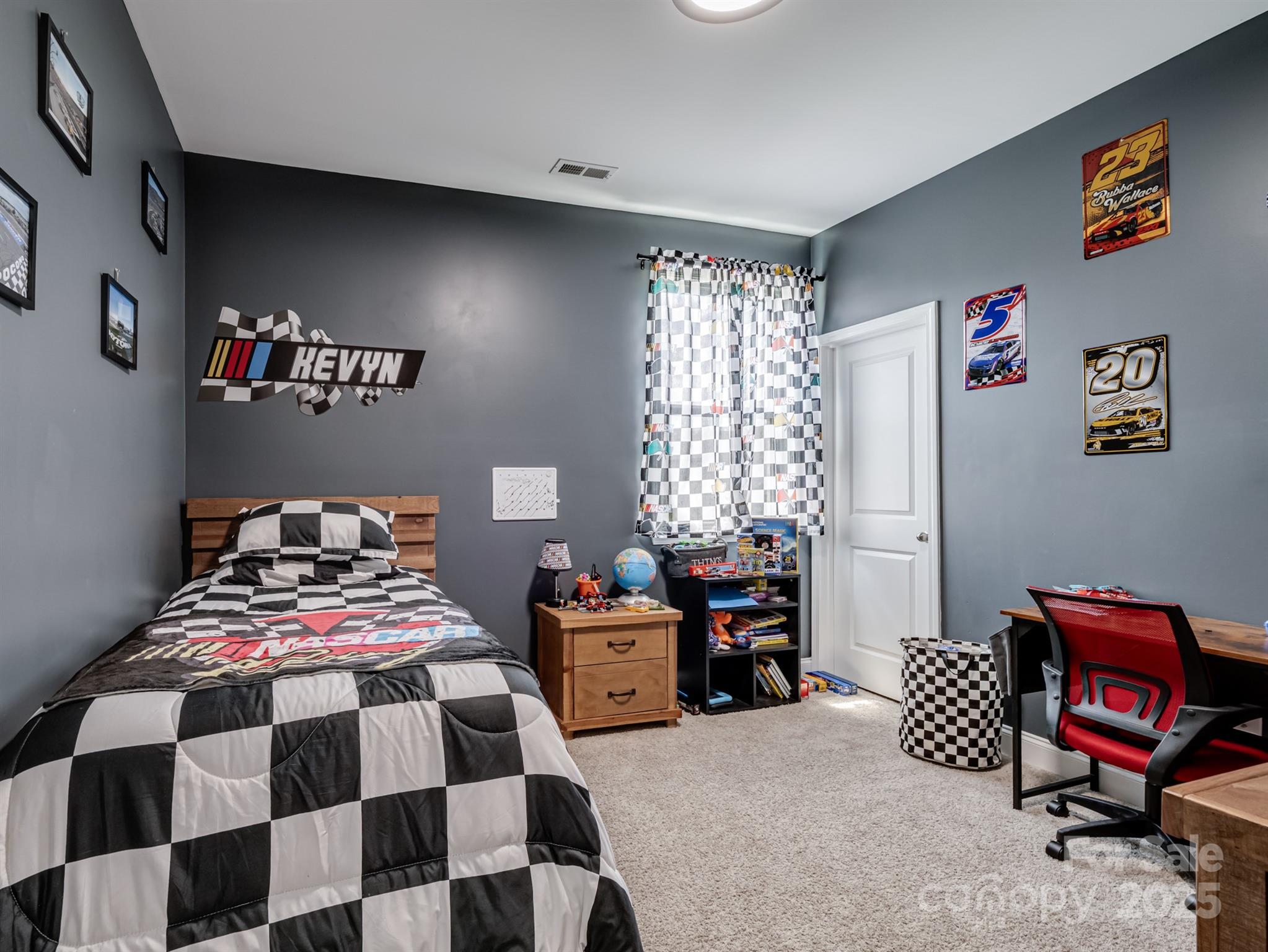 15213 Shallow Ridge Road Charlotte, NC 28278 - Photo 34 of 48 a bedroom with two beds and a chair