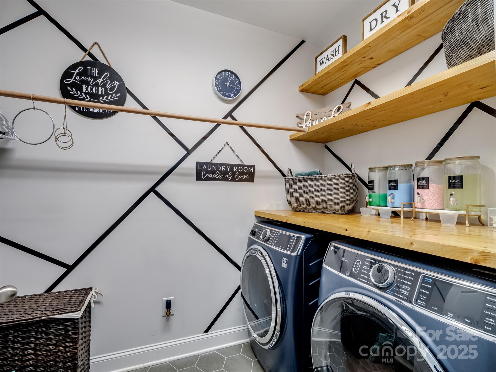 15213 Shallow Ridge Road Charlotte, NC 28278 - Photo 39 of 48 a utility room with dryer and washer