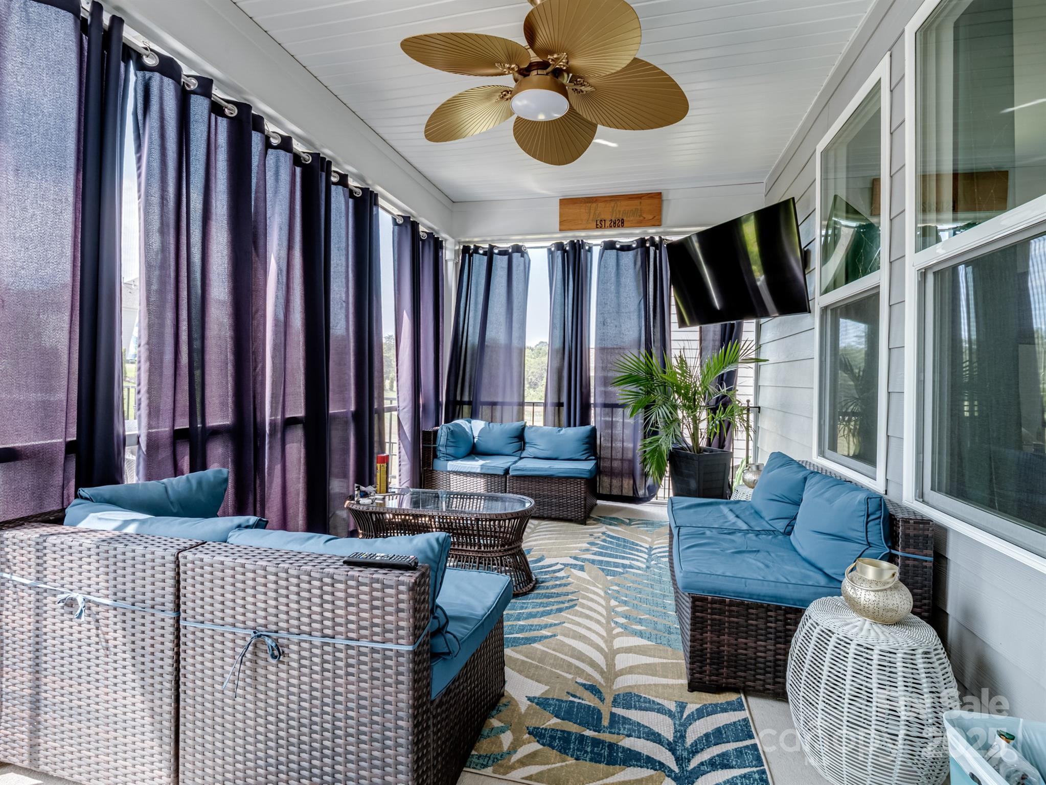 15213 Shallow Ridge Road Charlotte, NC 28278 - Photo 4 of 48 a living room with furniture and a large window