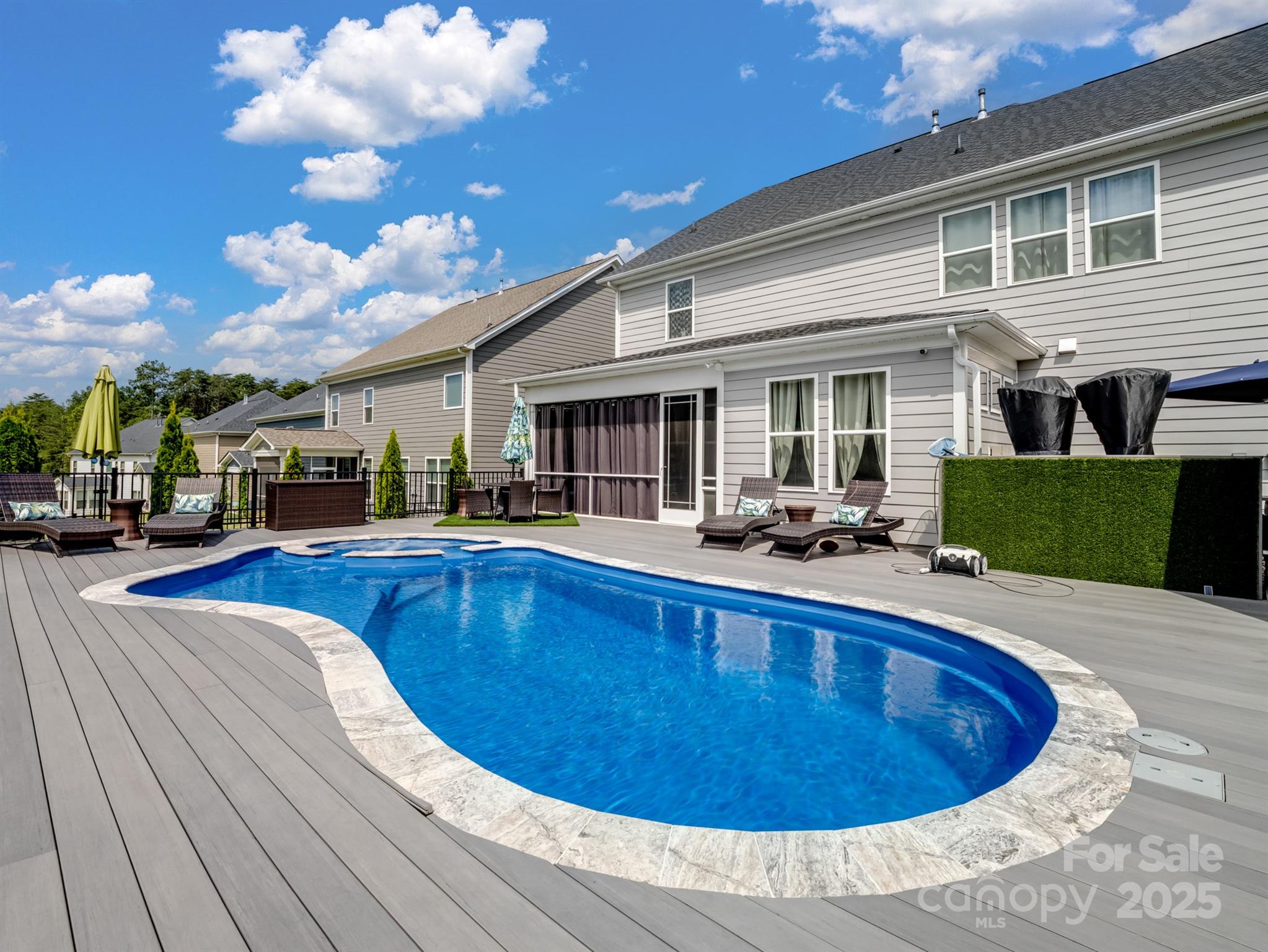 15213 Shallow Ridge Road Charlotte, NC 28278 - Photo 42 of 48 a view of a house with swimming pool and furniture