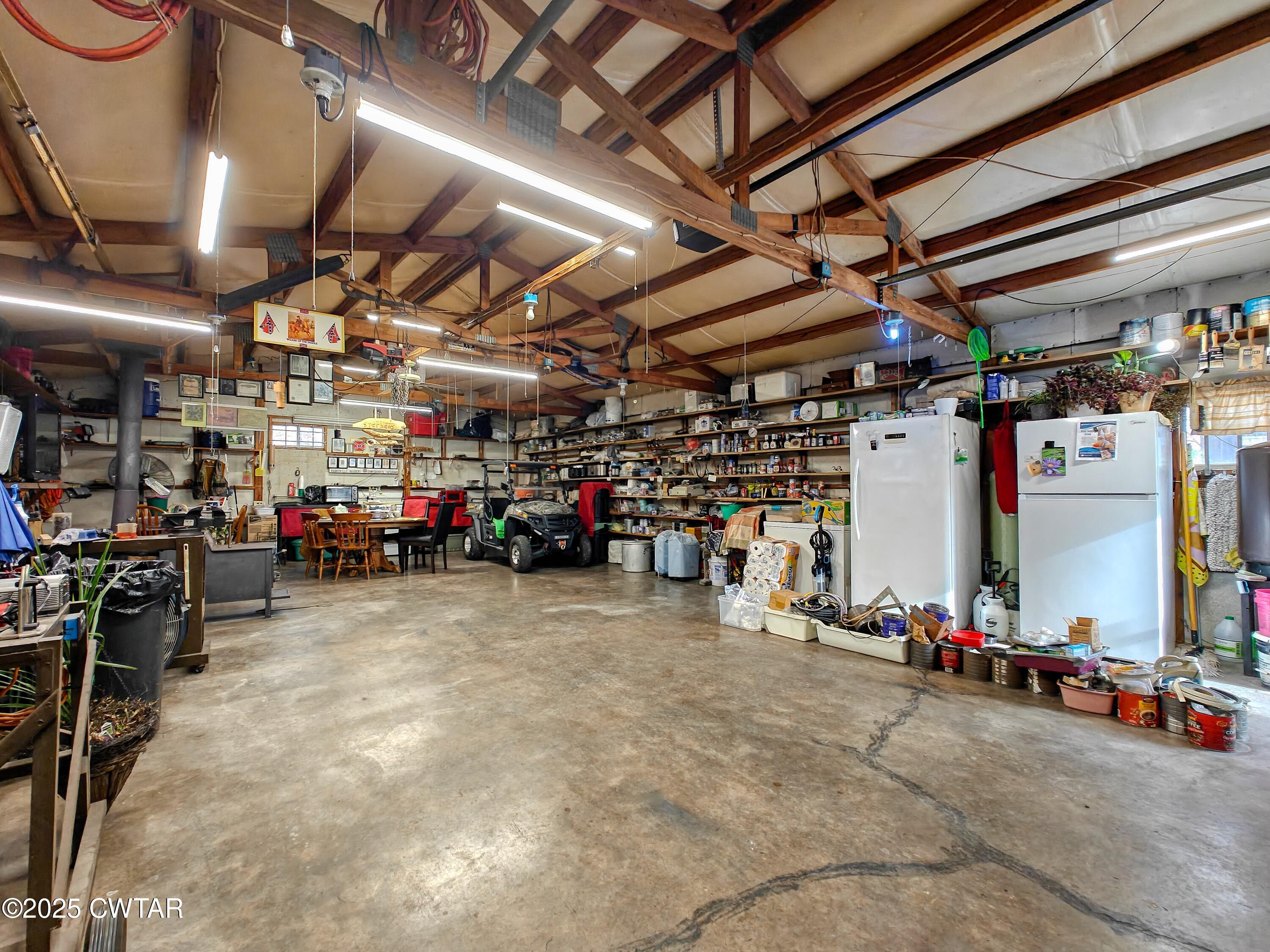 315 Coast Guard Road Buchanan, TN 38222 - Photo 33 of 41 a view of a garage with storage