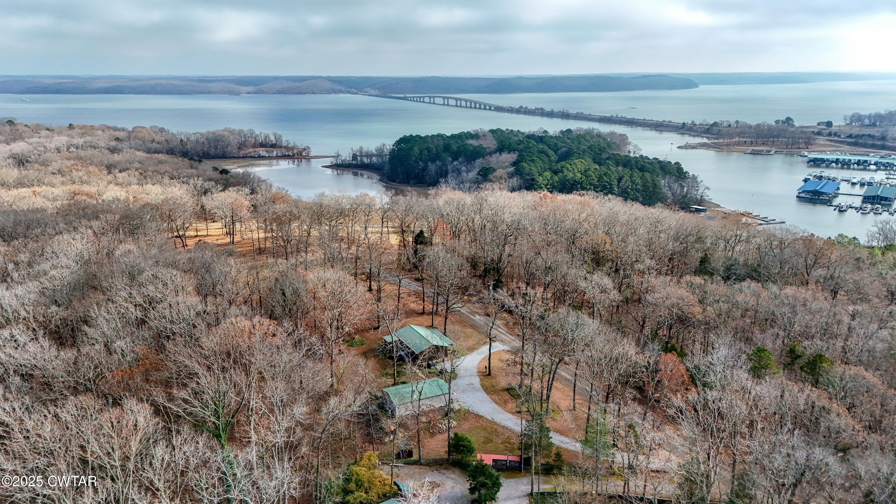 315 Coast Guard Road Buchanan, TN 38222 - Photo 39 of 41 a view of a lake with beach and ocean view