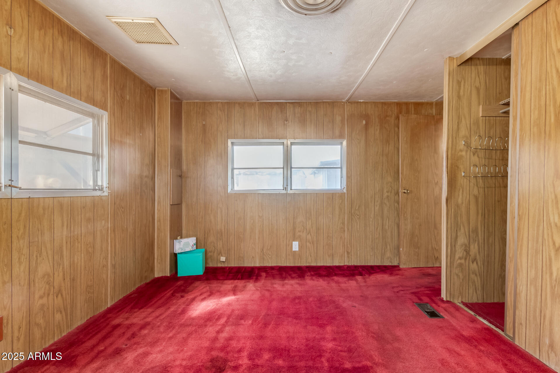 16225 North Cave Creek Road, Unit 1 Phoenix, AZ 85032 - Photo 12 of 33 a view of an empty room with a window