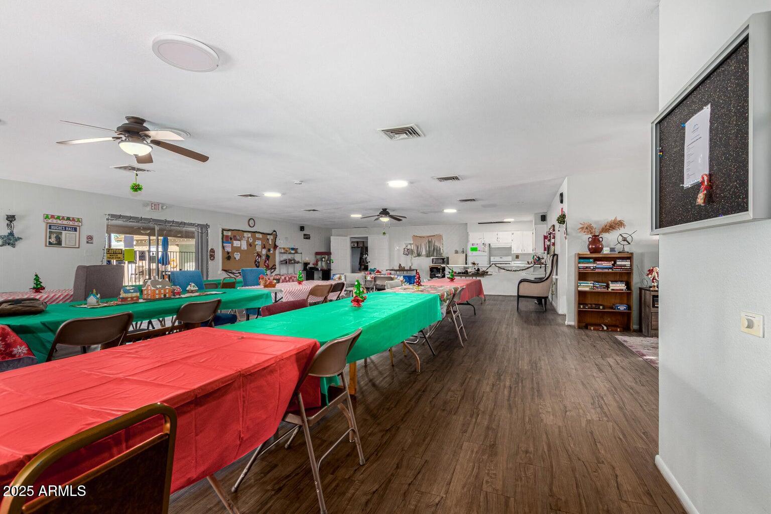 16225 North Cave Creek Road, Unit 1 Phoenix, AZ 85032 - Photo 25 of 33 a view of a dining room with furniture window and wooden floor