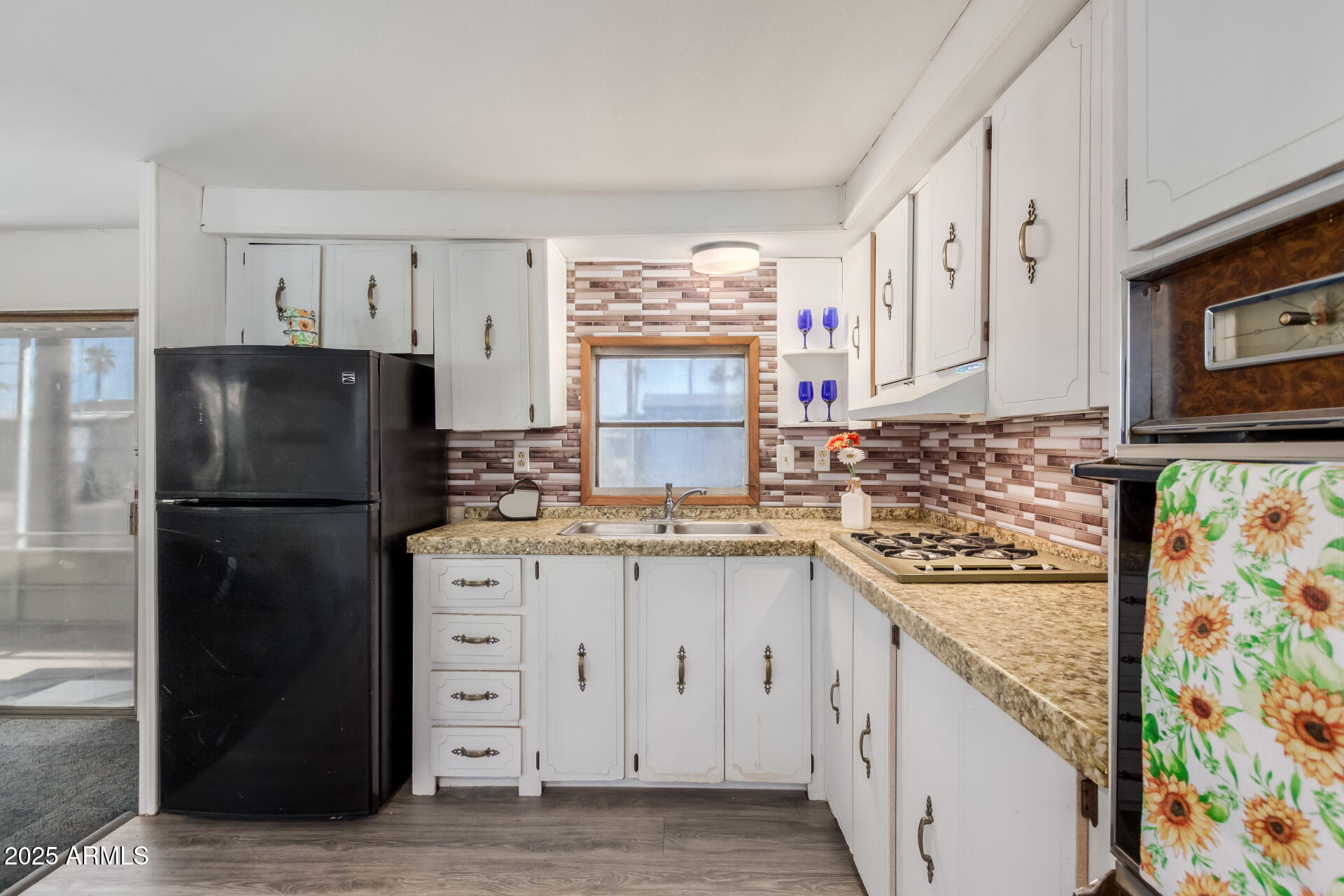16225 North Cave Creek Road, Unit 1 Phoenix, AZ 85032 - Photo 28 of 33 a kitchen with stainless steel appliances granite countertop a refrigerator and a stove