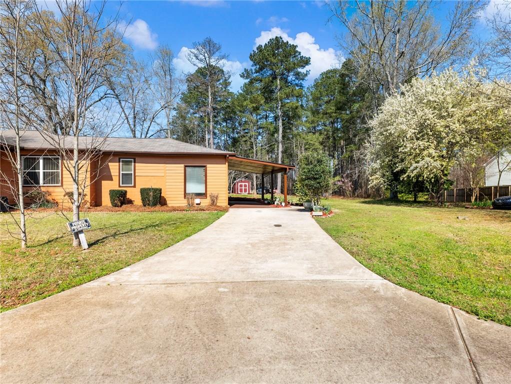 1686 Shoal Creek Road Monroe, GA 30656 - Photo 30 of 50 a view of house with a yard