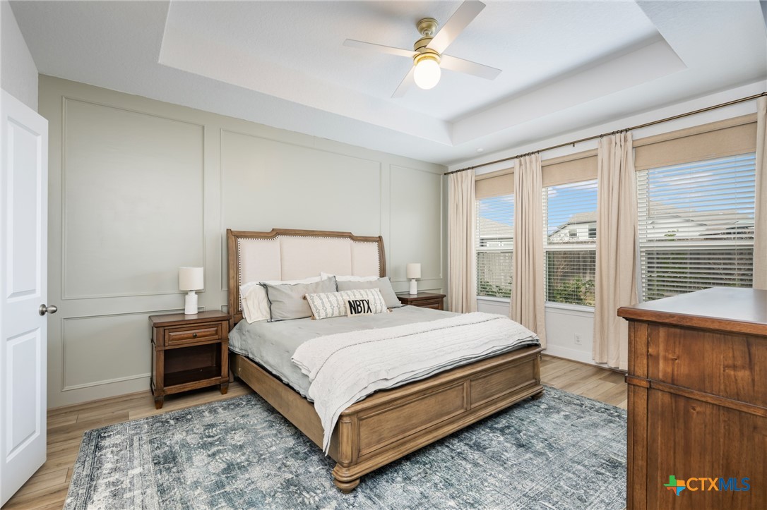 2939 Rems New Braunfels, TX 78130 - Photo 23 of 41 a bedroom with a bed and a large window