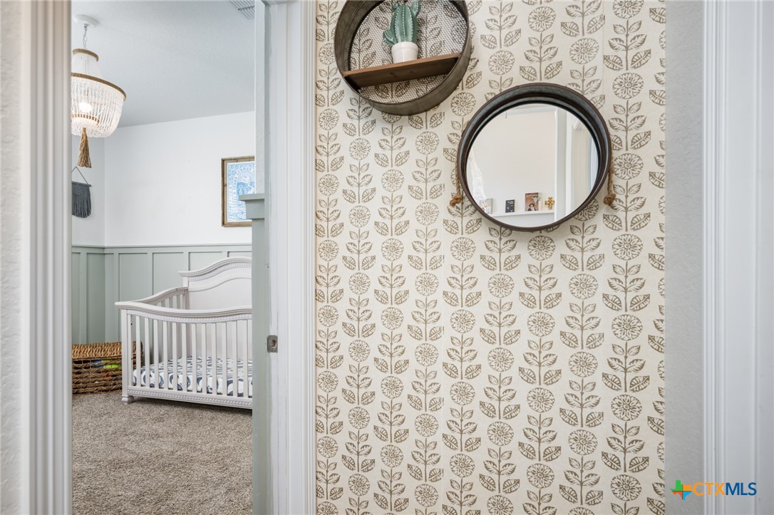 2939 Rems New Braunfels, TX 78130 - Photo 32 of 41 a view of a bathroom with a sink and a mirror