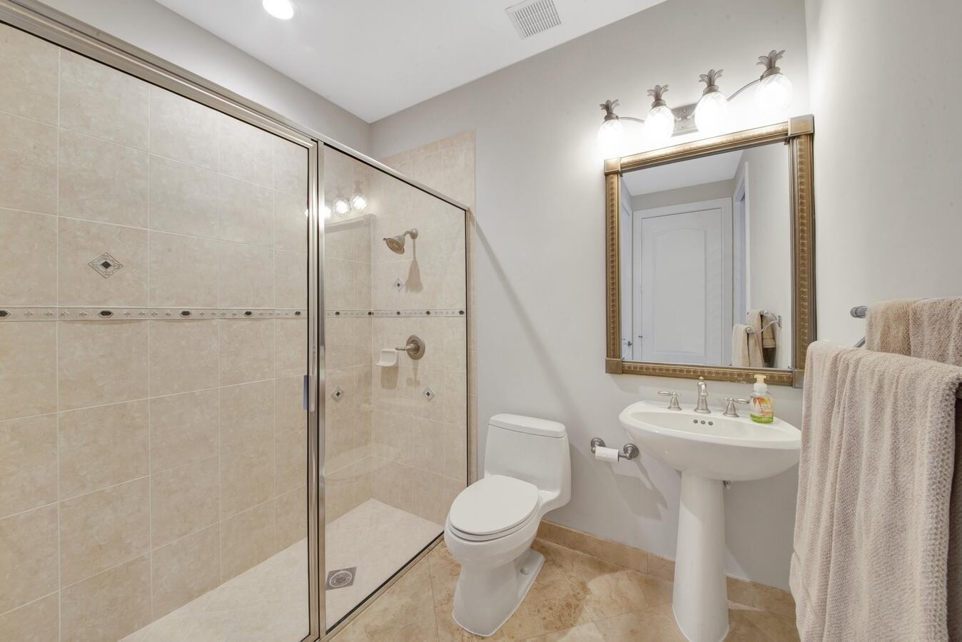 9170 Equus Circle Boynton Beach, FL 33472 - Photo 23 of 71 a bathroom with a sink toilet and shower