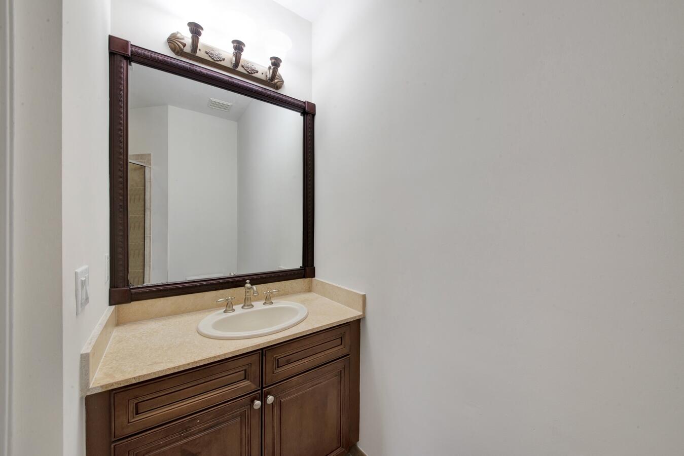 9170 Equus Circle Boynton Beach, FL 33472 - Photo 43 of 71 a bathroom with a sink and a mirror