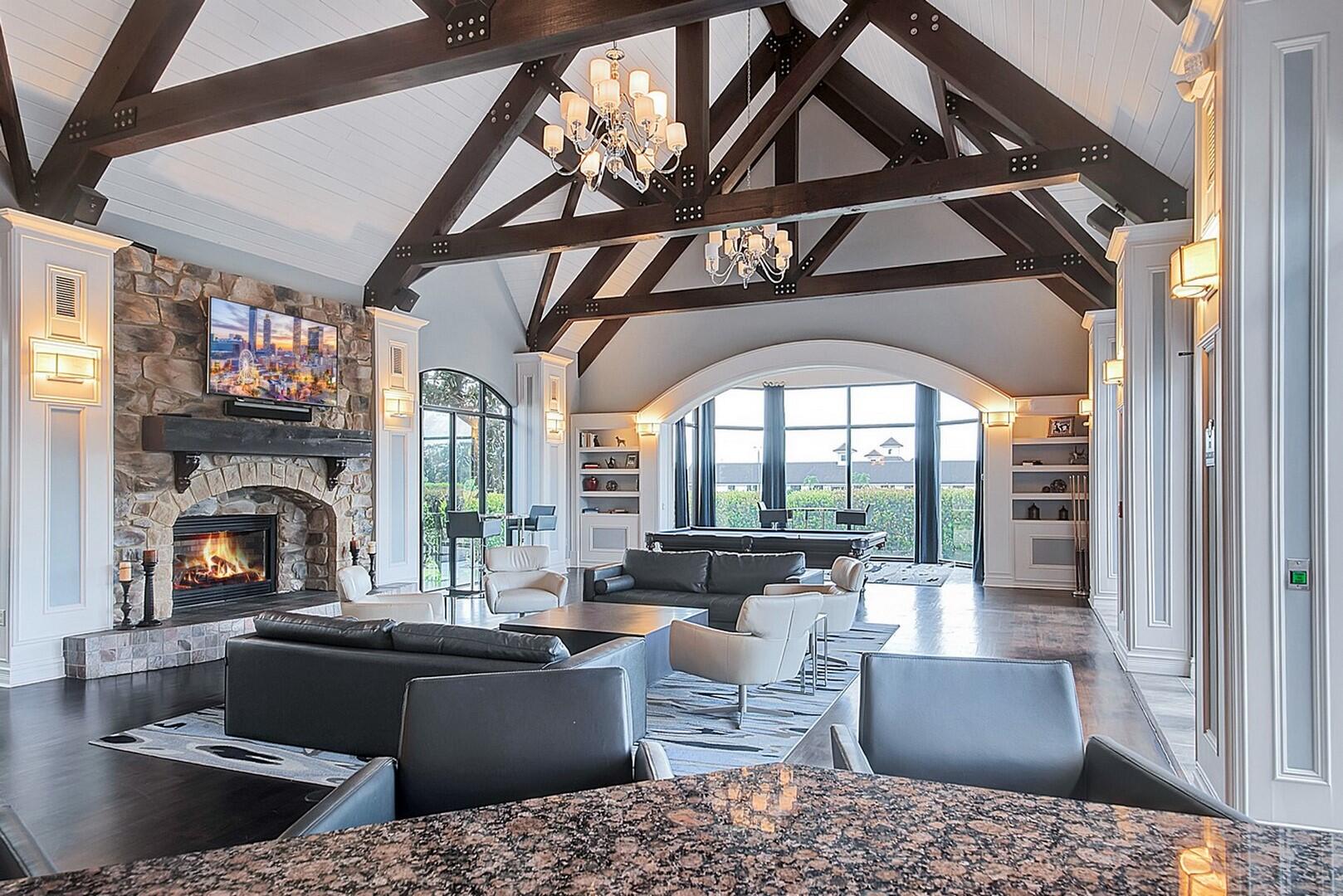 9170 Equus Circle Boynton Beach, FL 33472 - Photo 65 of 71 a living room with furniture and a fireplace