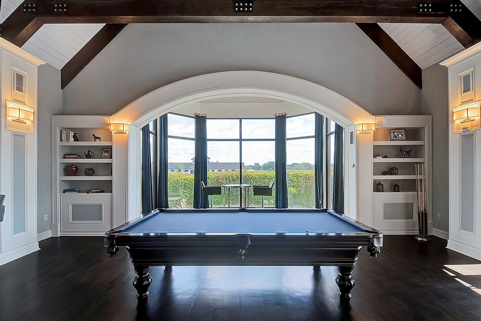 9170 Equus Circle Boynton Beach, FL 33472 - Photo 66 of 71 a view of a room with a table and chairs