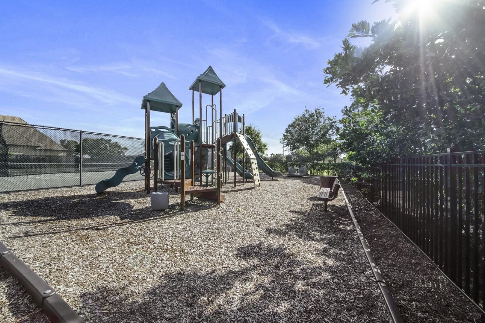 9170 Equus Circle Boynton Beach, FL 33472 - Photo 69 of 71 a view of a park with swings