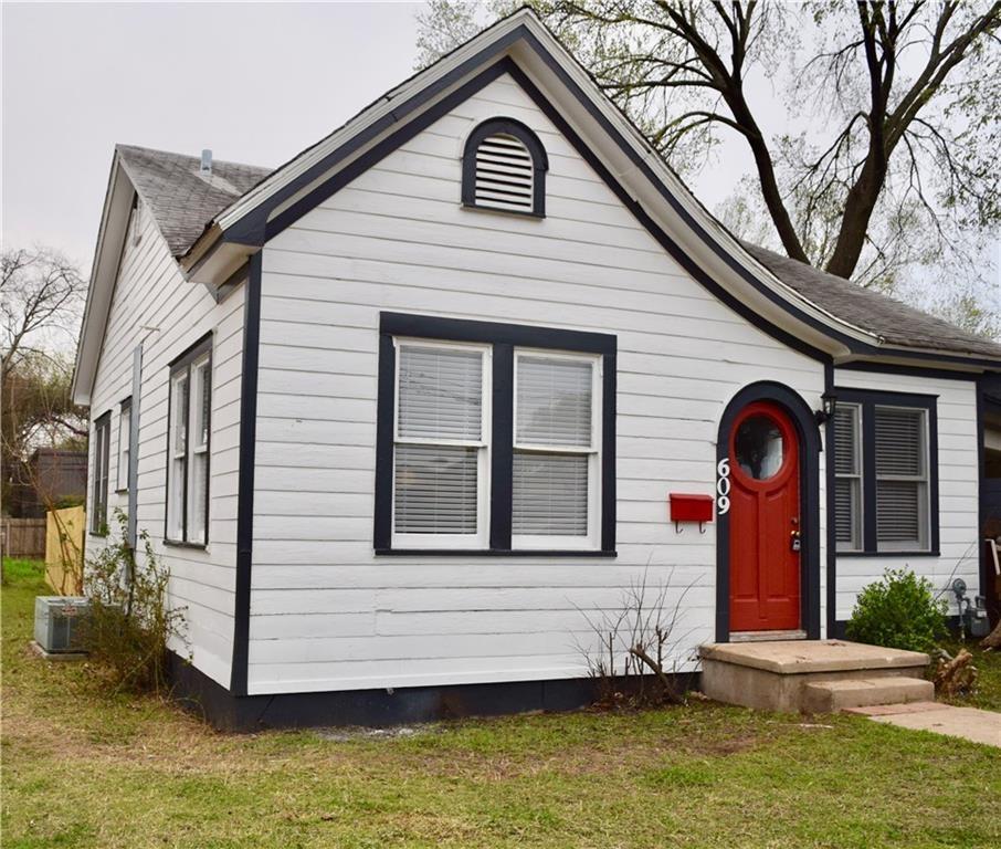 609 Nelray Boulevard Austin, TX 78751 - Photo 1 of 1 a view of a house with a yard and balcony