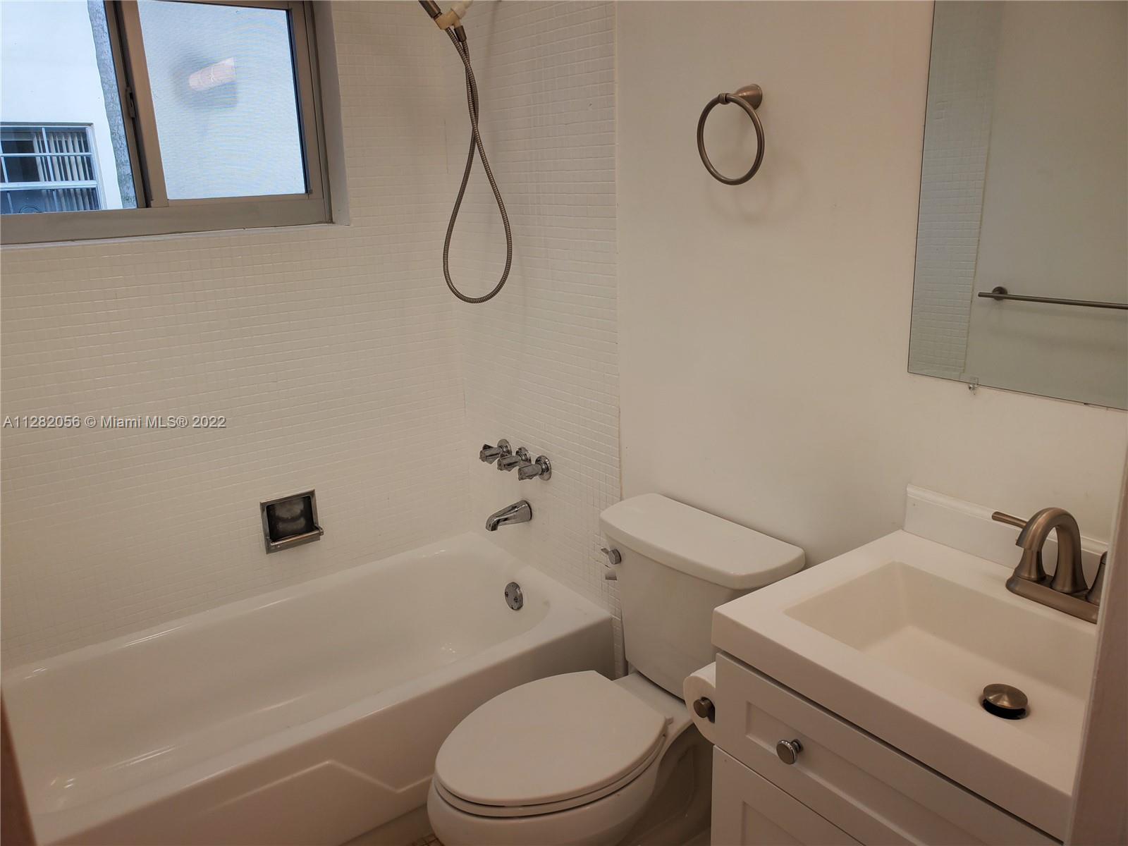 West Perrine Miami, FL 33157 - Photo 11 of 24 a bathroom with a sink toilet and shower