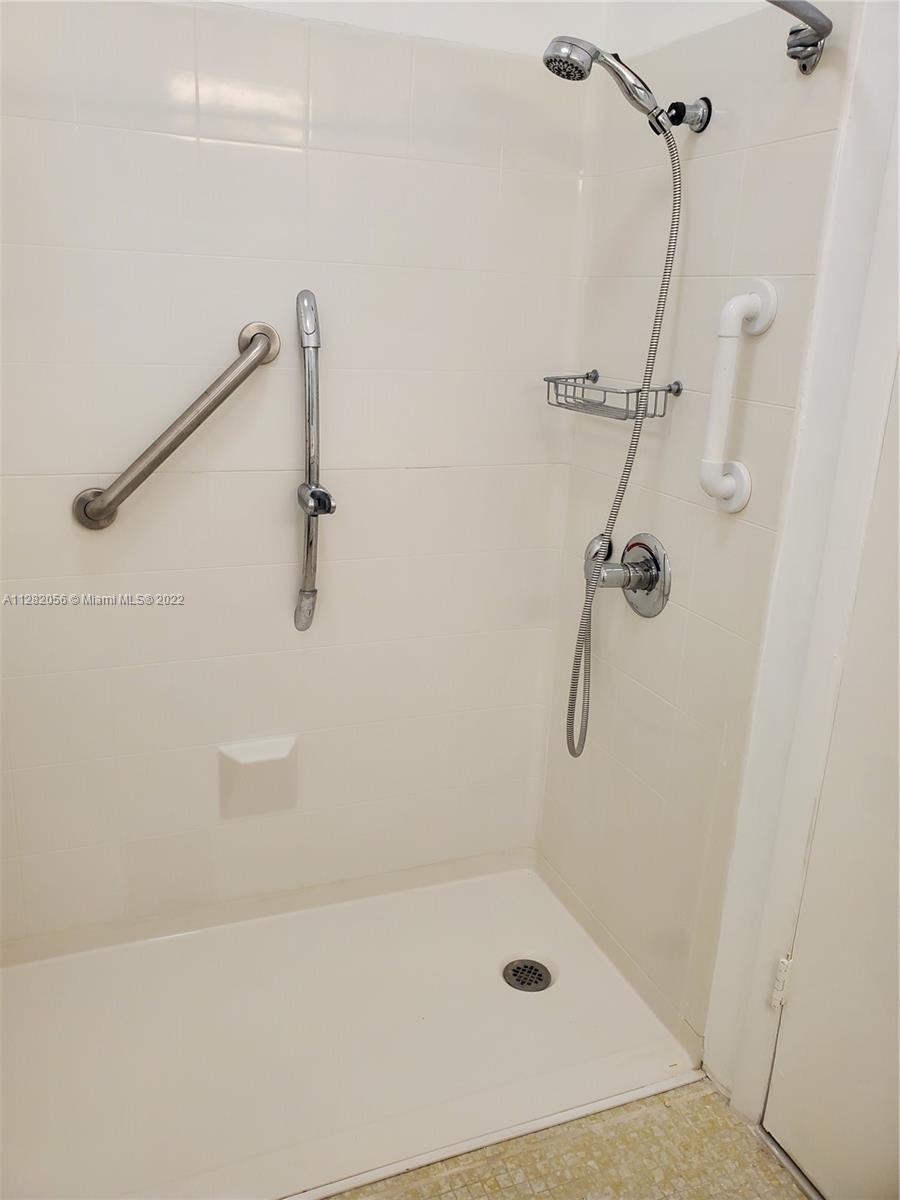 West Perrine Miami, FL 33157 - Photo 17 of 24 a bathroom with a bath tub with a shower