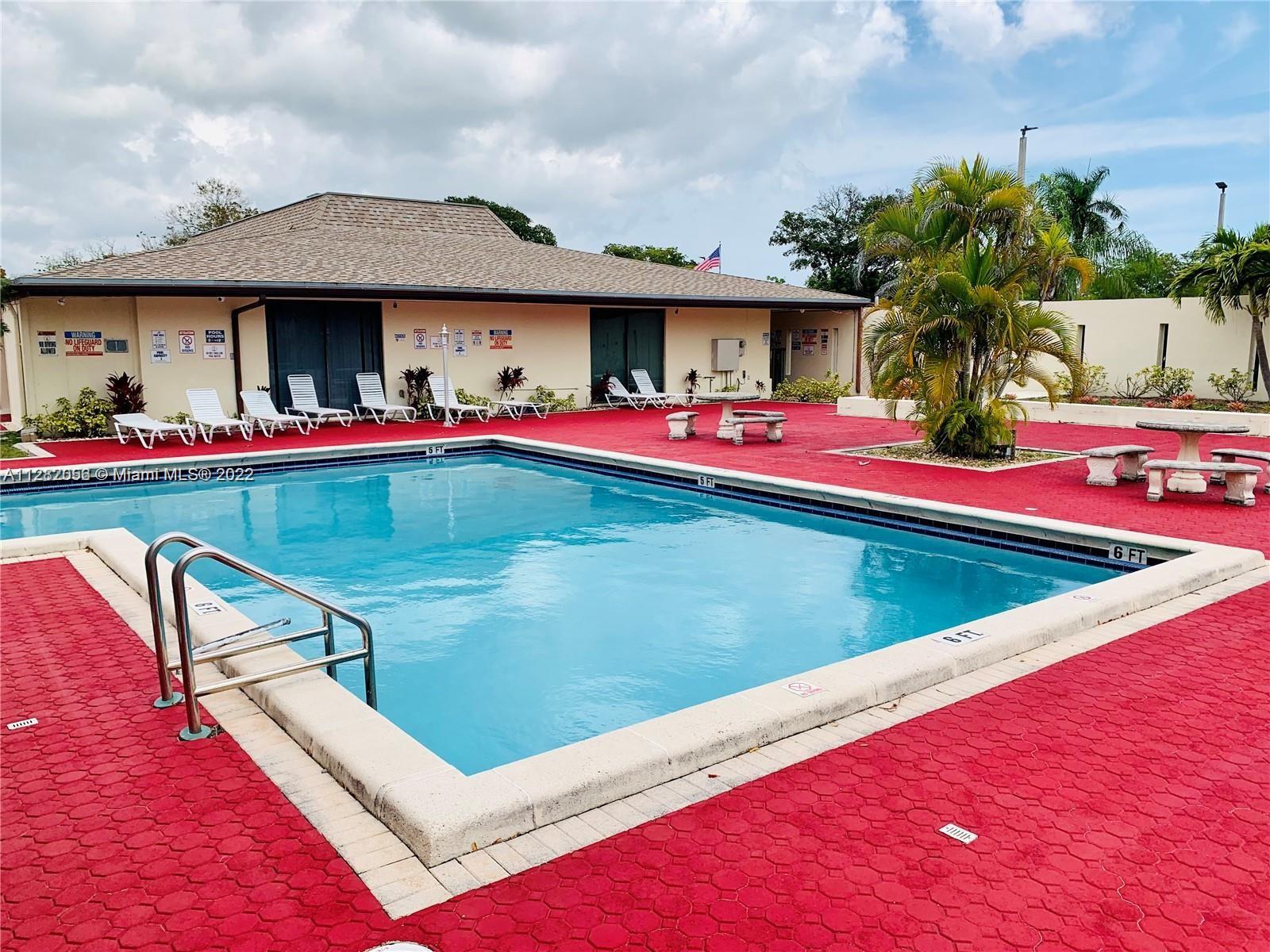 West Perrine Miami, FL 33157 - Photo 19 of 24 a view of a house with swimming pool and sitting area