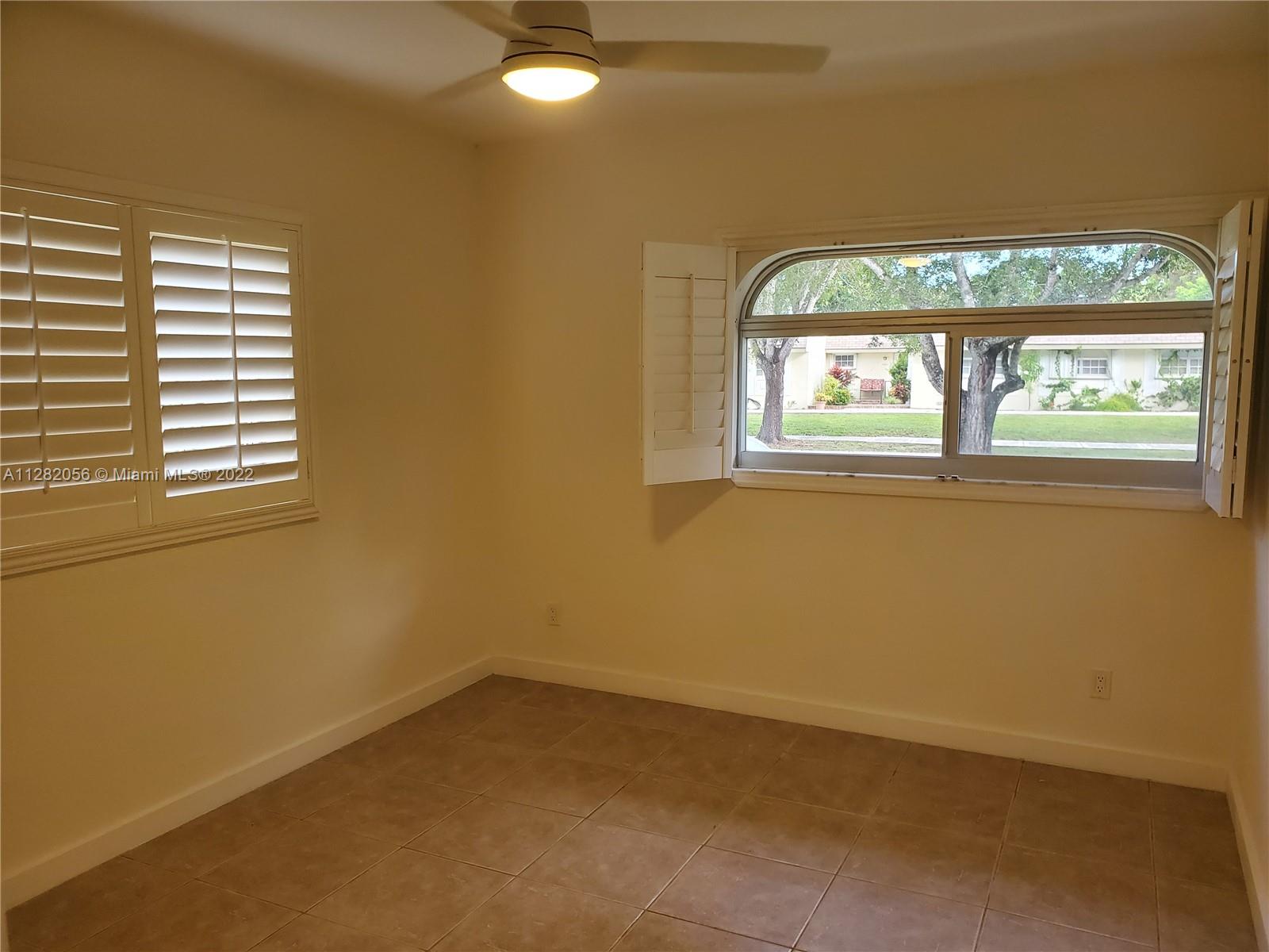 West Perrine Miami, FL 33157 - Photo 10 of 24 an empty room with windows
