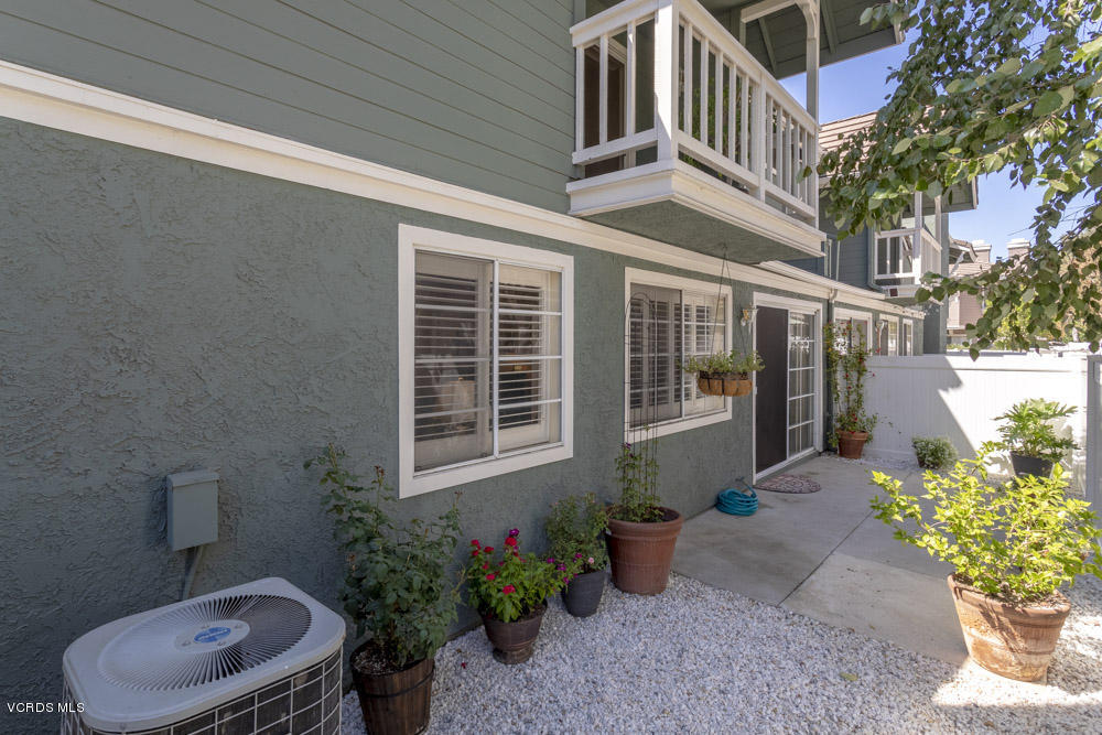1920 Rory Lane, Unit 4 Simi Valley, CA 93063 - Photo 11 of 24 a view of a house with a yard and sitting area