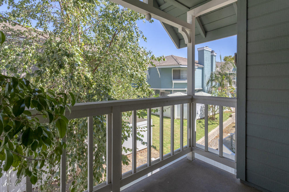 1920 Rory Lane, Unit 4 Simi Valley, CA 93063 - Photo 15 of 24 a view of a balcony with a tree