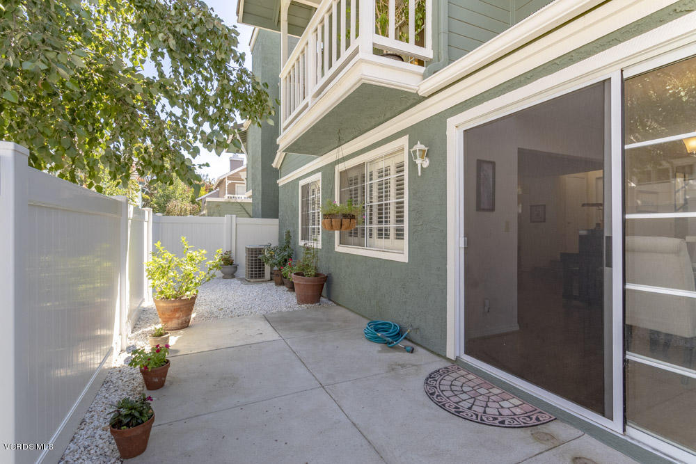 1920 Rory Lane, Unit 4 Simi Valley, CA 93063 - Photo 10 of 24 a front view of a house with outdoor seating