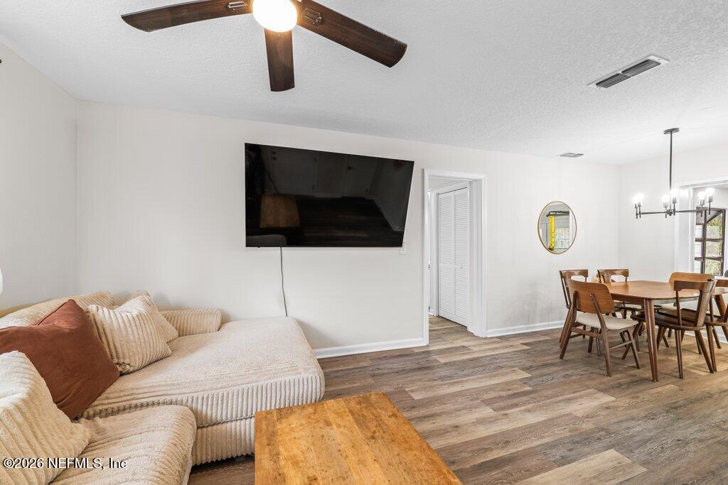 1138 Halifax Road Jacksonville, FL 32216 - Photo 15 of 34 a living room with furniture and a flat screen tv