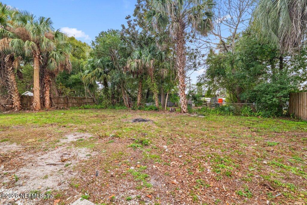 1138 Halifax Road Jacksonville, FL 32216 - Photo 23 of 34 a view of outdoor space with trees all around