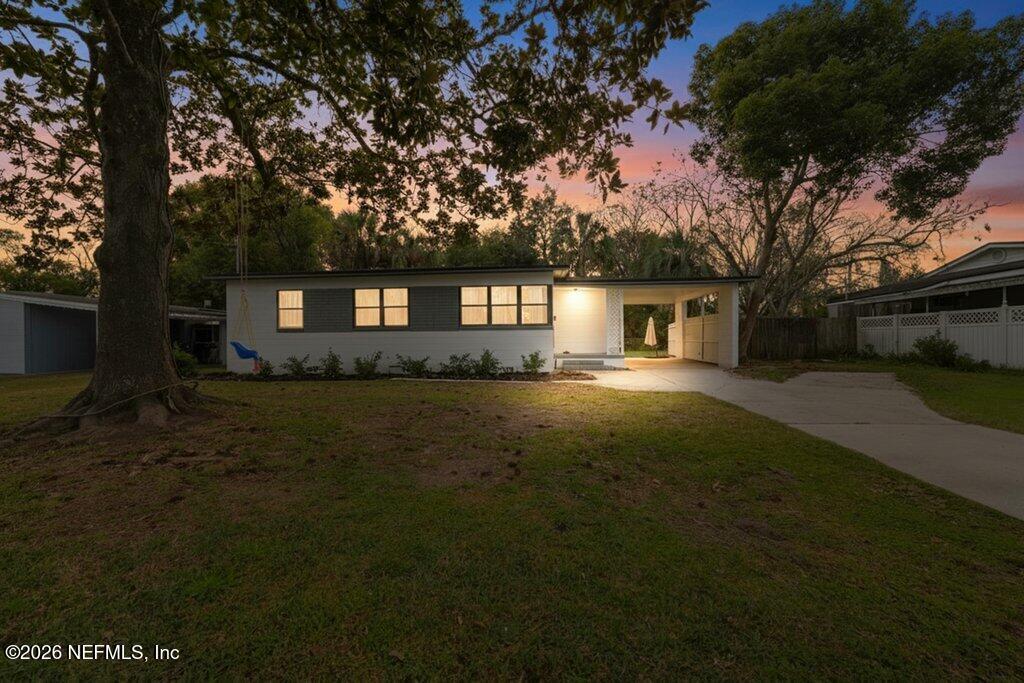 1138 Halifax Road Jacksonville, FL 32216 - Photo 34 of 34 a front view of a house with a garden