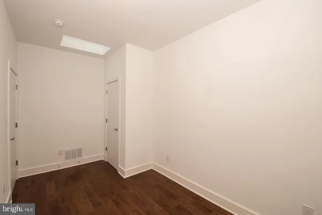 a view of small space with wooden floor