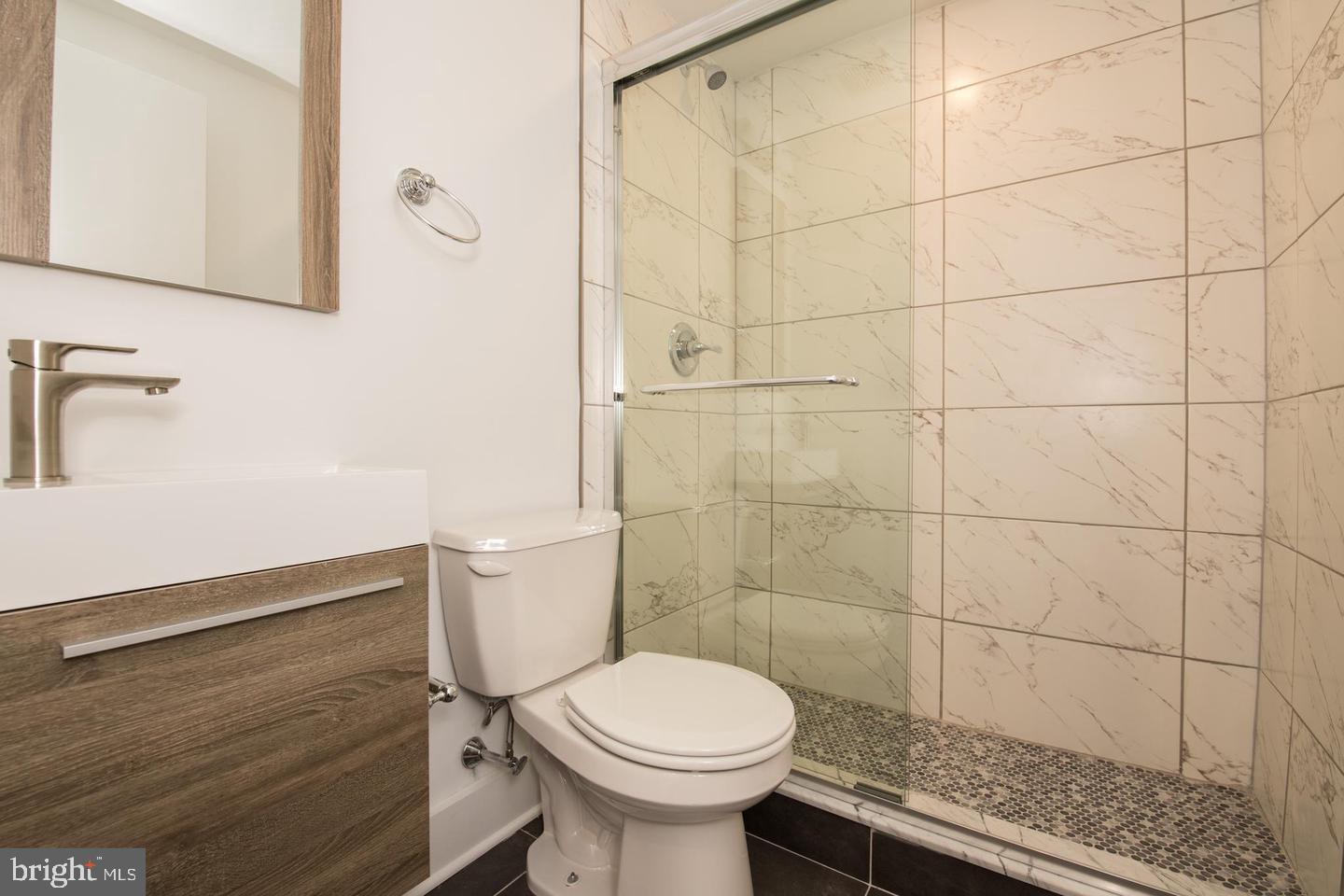 1956 North 8th Street, Unit 2 Philadelphia, PA 19122 - Photo 7 of 23 a bathroom with a toilet and a sink
