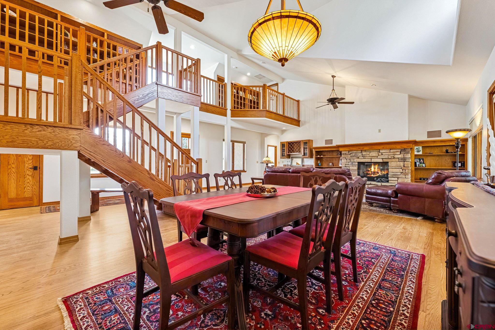 345 Red Rock Road Durango, CO 81301 - Photo 14 of 44 a view of a dining room with furniture