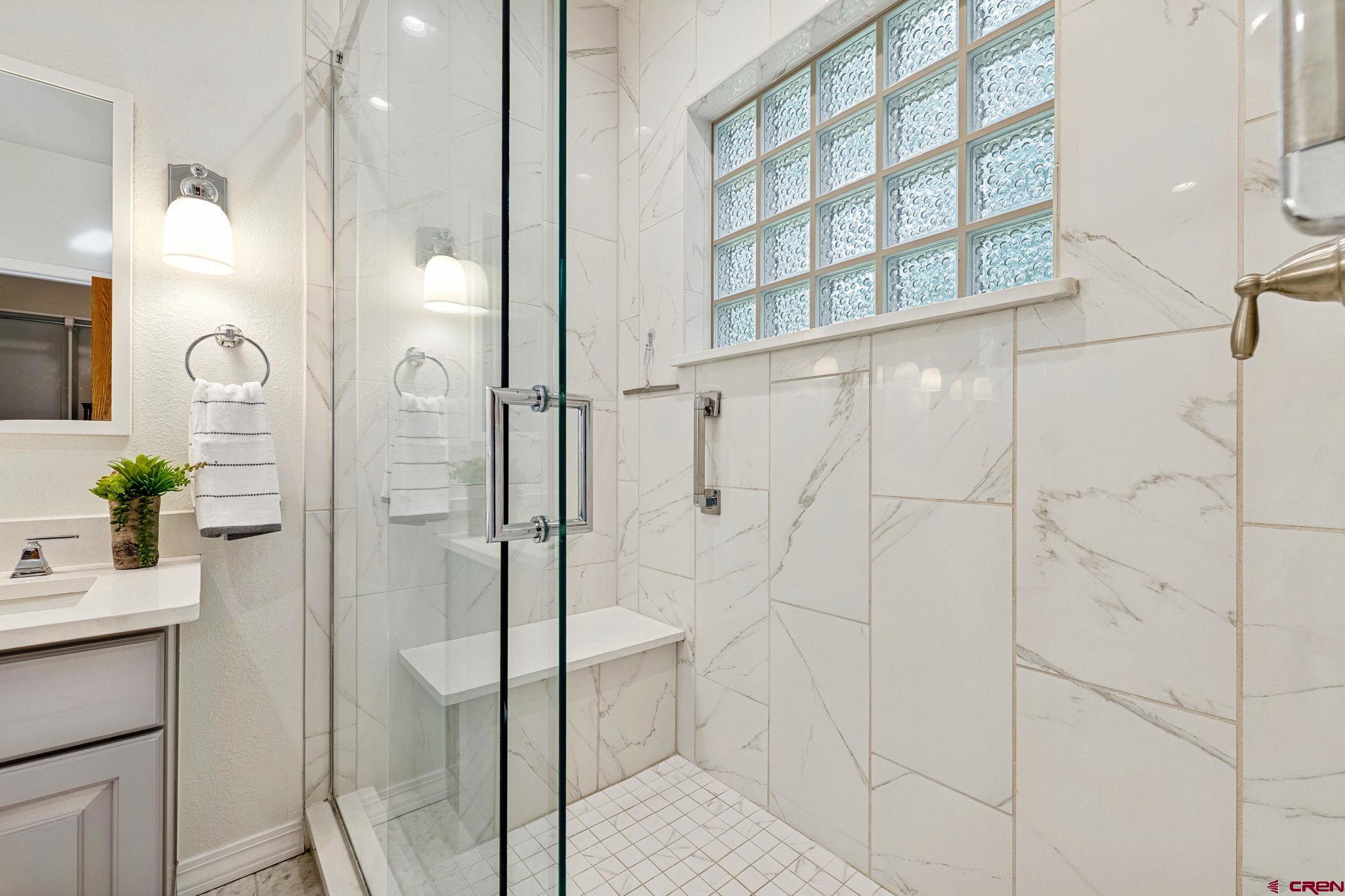 345 Red Rock Road Durango, CO 81301 - Photo 22 of 44 a bathroom with a shower