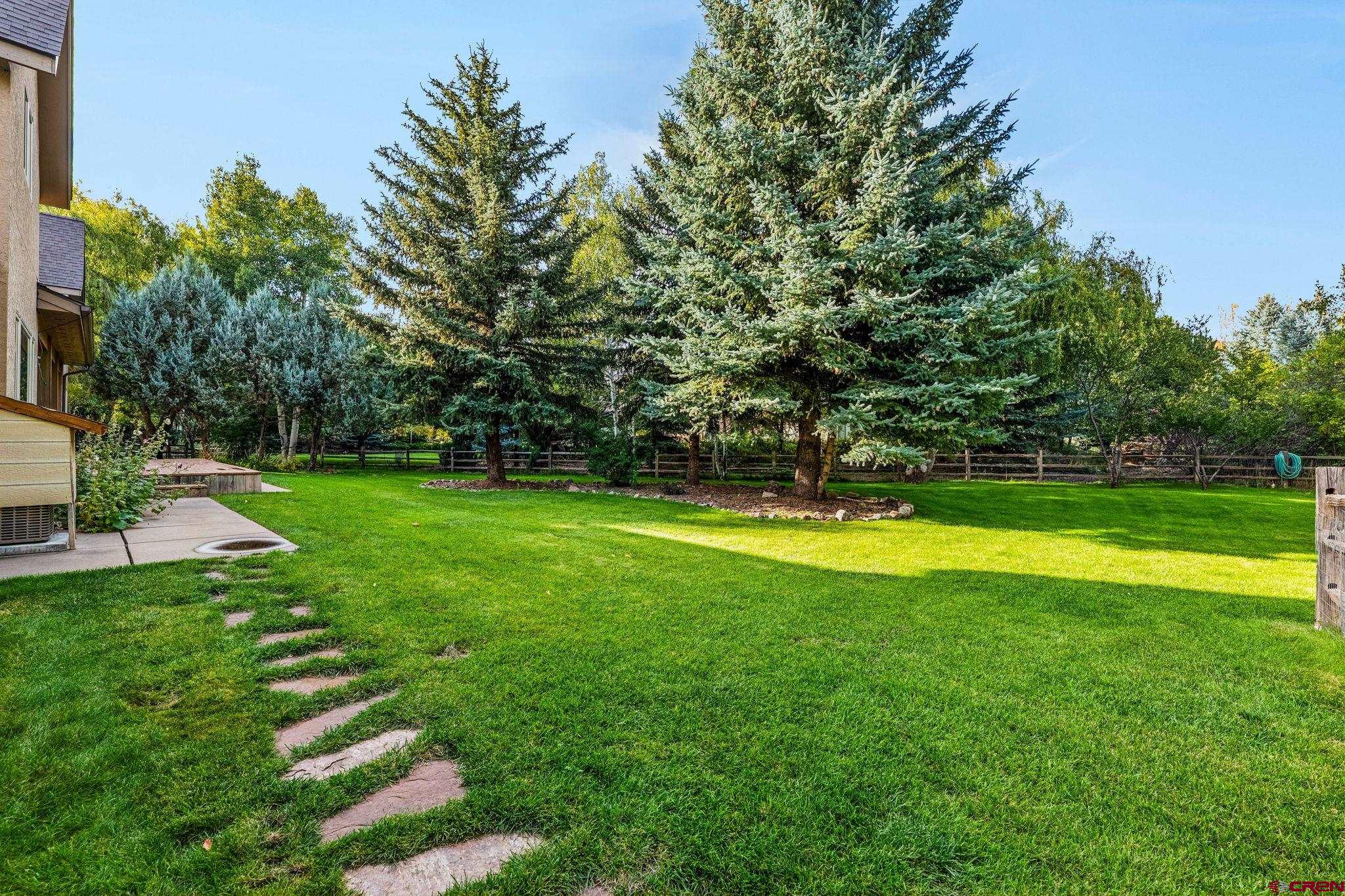 345 Red Rock Road Durango, CO 81301 - Photo 40 of 44 a view of a park with large trees